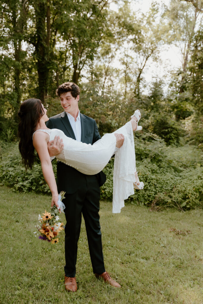 The groom spinning his bride around